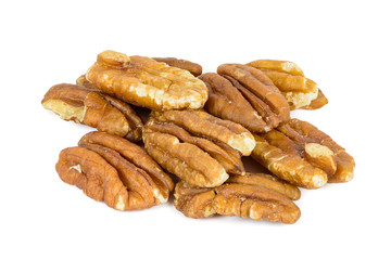 Heap of pecan nuts on white background