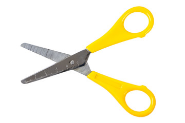 Yellow scissors with ruler isolated on white background