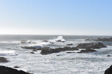 waves breaking on the rocks