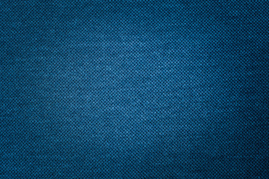 Dark blue fabric texture of cloth that is structurally textile fabric fibers background use us space for text or image backdrop design
