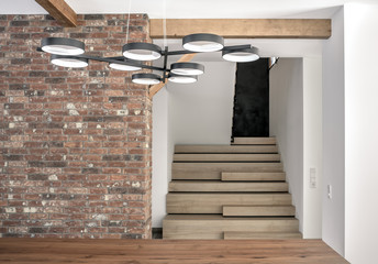 Stylish interior in modern style with wooden beams