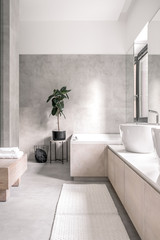Fototapeta na wymiar Stylish bathroom in modern style with different walls
