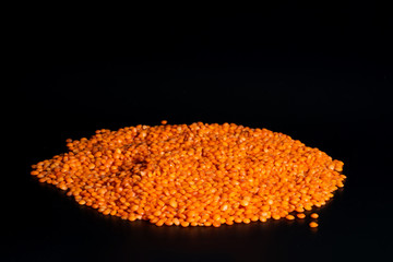 A pile of red lentils