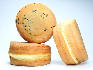 Front view of three wheel pies ( also called custard pancake) isolated. Wheel pie is a popular snack in Taiwan. Taiwanese food concept. Dessert time.