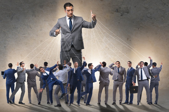 Boss employee manipulating his staff in business concept