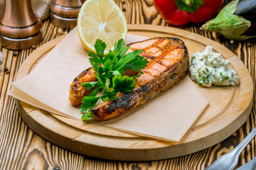 Salmon steak on the grill