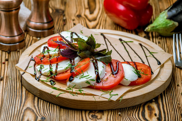 Caprese salad with mozzarella and tomato
