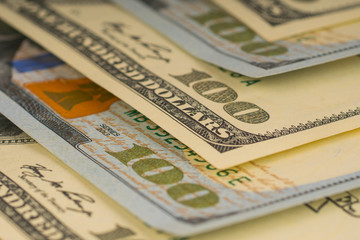 100 dollars, background with paper money