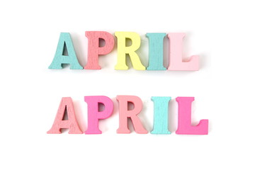 colorful April word letters alphabet isolated on white background