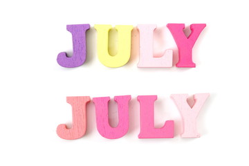 colorful July word letters alphabet isolated on white background