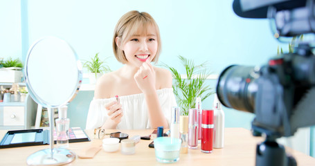 woman show lipstick in live