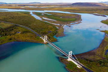 Green river and white bridge