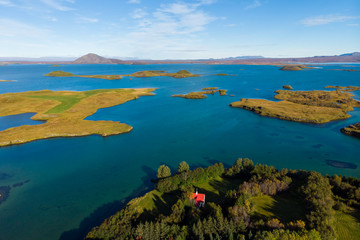 Red roof house and blue lake