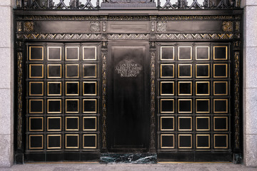 Front entrance doors to the Alfred E. Smith State Office Building in downtown Albany, New York