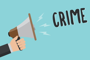 Conceptual hand writing showing Crime. Business photo showcasing Federal Offense actions Illegal Activities punishable by Law Man holding megaphone blue background message speaking loud