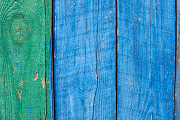 Fototapeta na wymiar Old wooden painted blue rustic background, paint peeling
