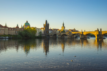 Fototapeta premium Charles Bridge with sunrise in Prague, Czech Republic