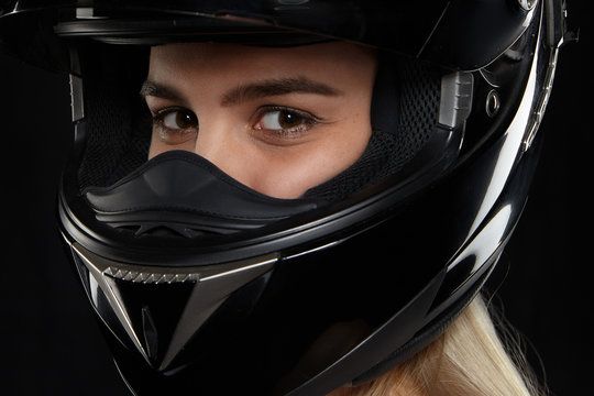 Close Up Portrait Of Caucasian Female Motorcycle Racer With Happy Eyes Wearing Black Modern Safety Helmet Going To Competition Feeling Excited Speed Extreme Danger And Activity Concept Stock Photo Adobe Stock
