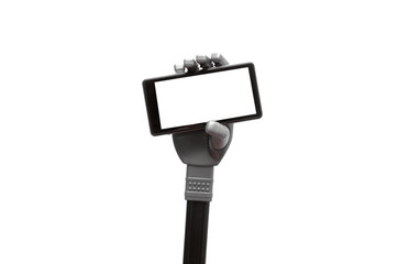 Toy robot hand is holding a mobile phone with blank screen isolated on white background.