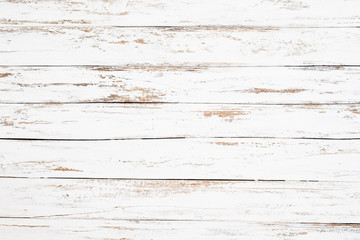 Wood plank painted in white weathered and old. Vintage and rustic white wooden background.