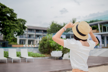 woman relaxing in luxury hotel, summer holidays