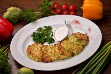 pancakes with potatoes and sour cream sauce