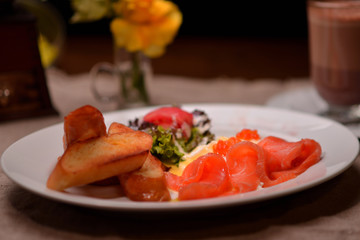 slicing salmon with croutons