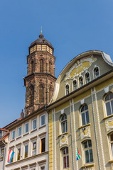 Fototapeta na wymiar Decorated facade and St. Jacobi tower in Gottingen, Germany
