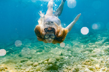 Snorkeling underwater in the tropical sea
