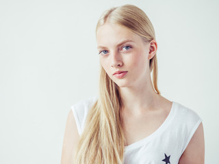Blonde woman with long smooth hair natural portrait