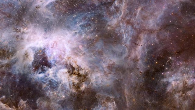 Travel to tarantula nebula large star field and cosmic clouds. Contains public domain image by NASA