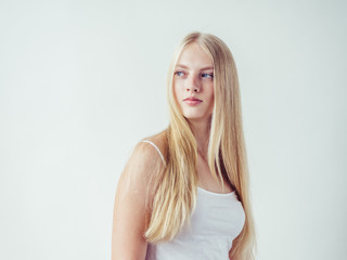Blonde woman with long smooth hair natural portrait