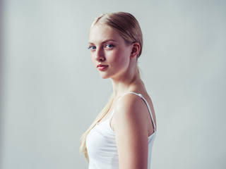 Blonde woman with long smooth hair natural portrait