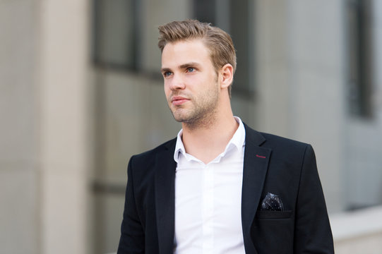 Businessman looking forward future opportunity. Man well groomed suit walk urban background. Businessman handsome office worker confident face. Businessman walk during lunch time. Dreamy businessman