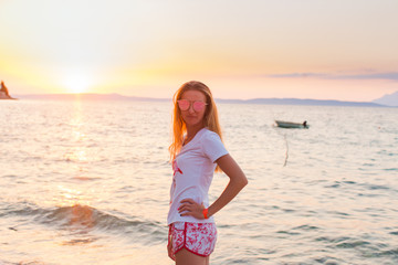 Fototapeta premium Attractive woman in front of the sea