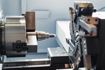 Modern lathe metalworking CNC machine.