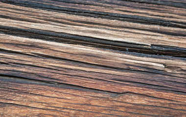 Old timber texture of the log surface of an old traditional wooden house