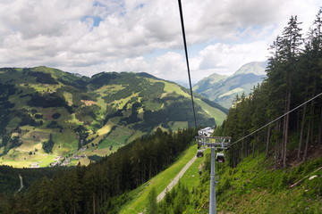 Saalbach-Hinterglemm valley aerial view from Schattberg cable car, Alps, Zell am See district, Salzburg federal state, Austria, summer cloudy day