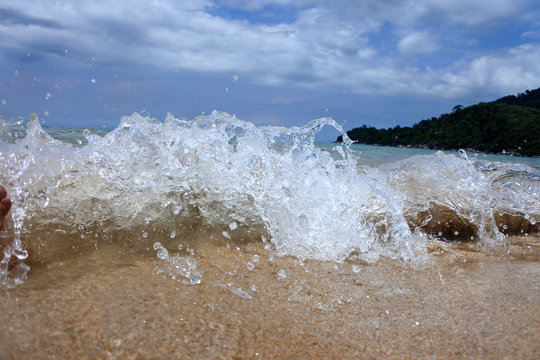 Small beach waves close up on the Tiomen Island of Malaysia