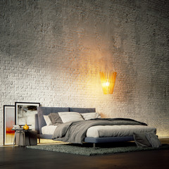 bed in minimalistic brick loft environment