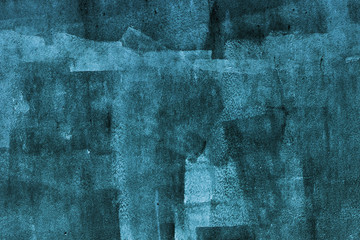 Concrete wall with dark blue paint layer