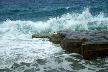 sea surf on stone
