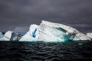 ice in the Antarctica with iceberg in the ocean