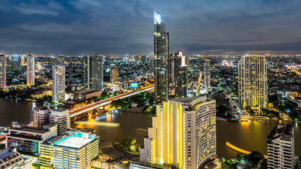 Bangkok city - Beautiful sunset curve Chao Phraya River panoramic Cityscape urban  of Bangkok city at night  , panorama landscape Thailand