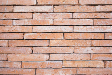 Background and texture of orange brick wall. Vintage style.