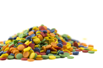 colorful candy confetti isolated on white background