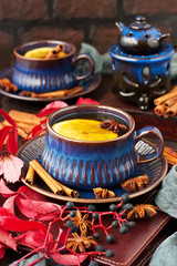 Cup of tea with lemon and spices