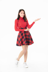 Beautiful Asain portrait woman in red casual dress standing and looking camera like holding something isolated on white background