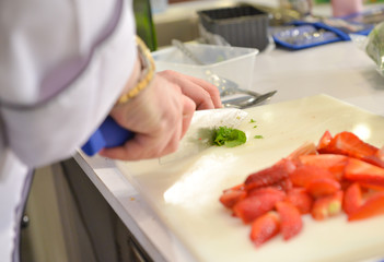 Chef preparing food, meal, in the kitchen, chef cooking, Chef decorating dish, closeup