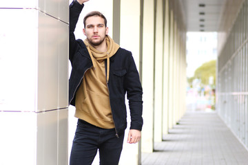 Young beard man in an autumn